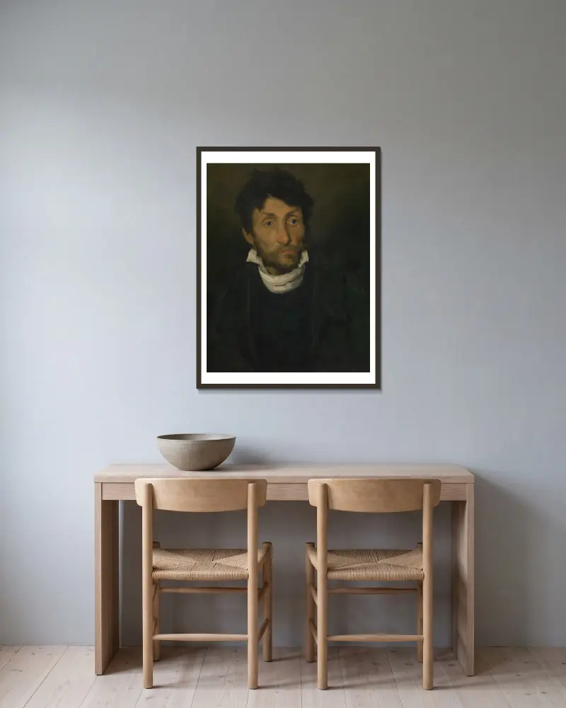 Portrait of a Kleptomaniac av Théodore Géricault inramad på en vägg