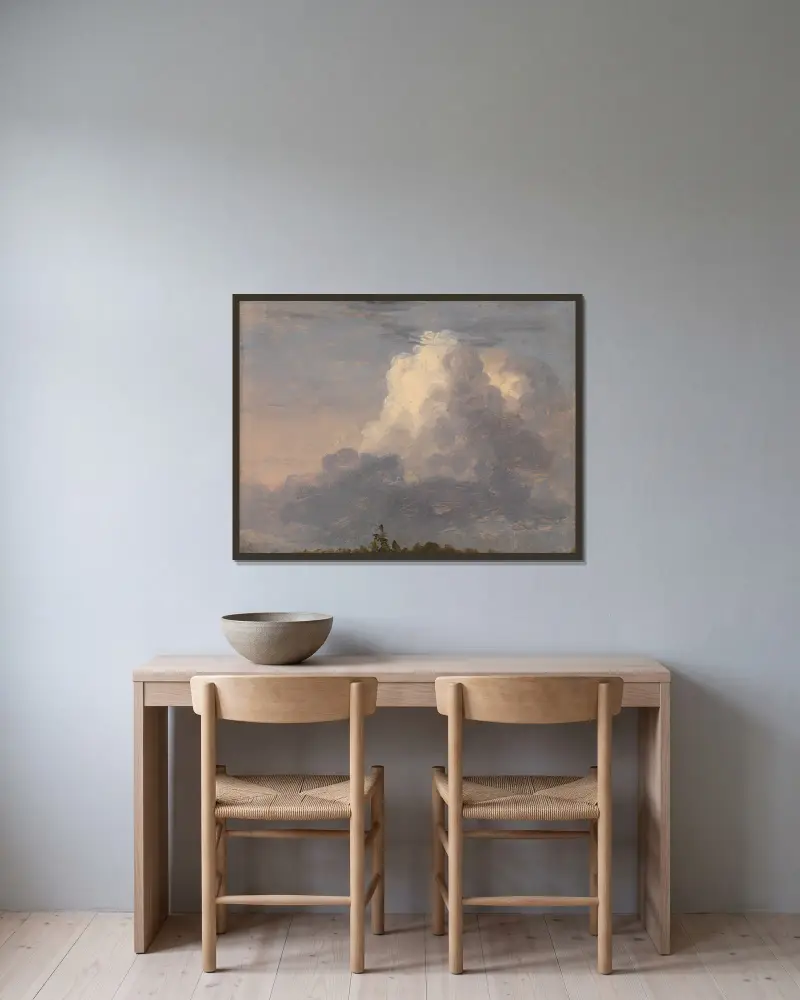 Wolken von Thomas Cole gerahmt an einer Wand