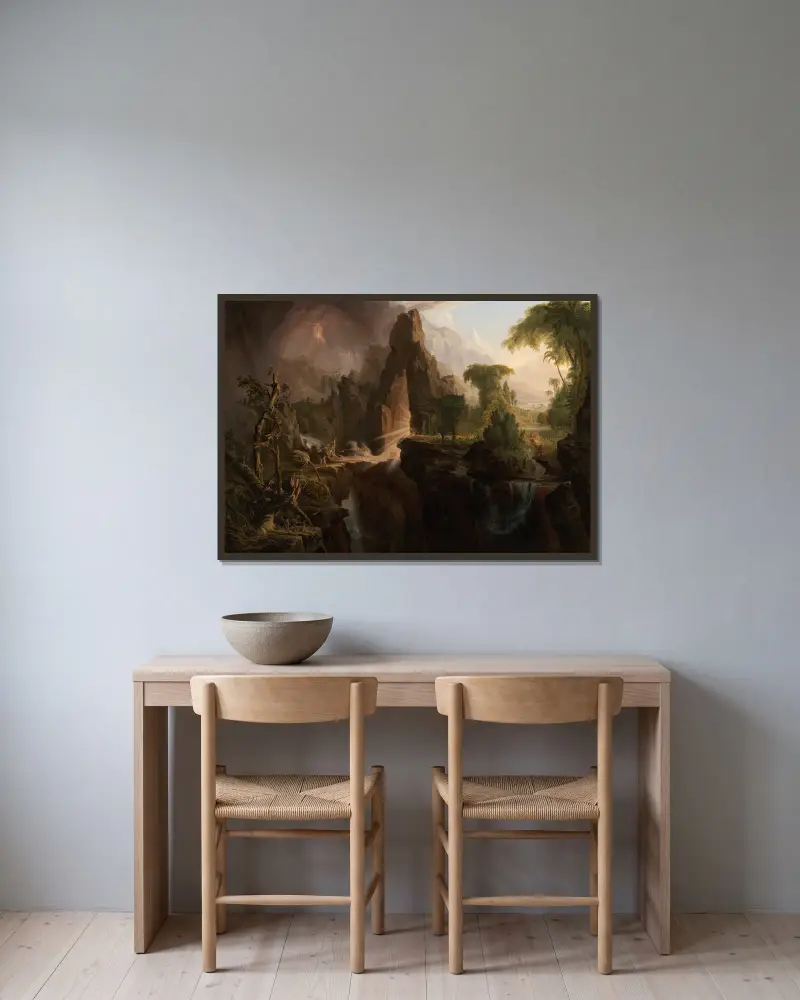 Expulsion from the Garden of Eden av Thomas Cole inramad på en vägg
