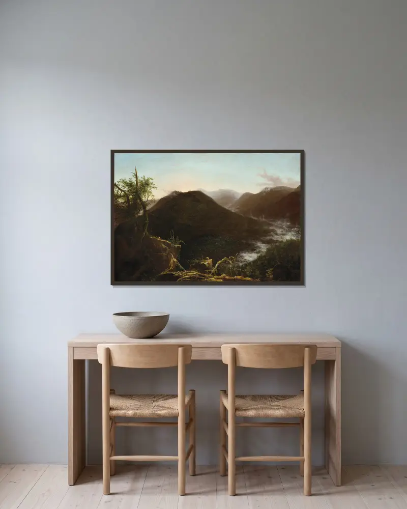 Sunrise in the Catskills av Thomas Cole inramad på en vägg