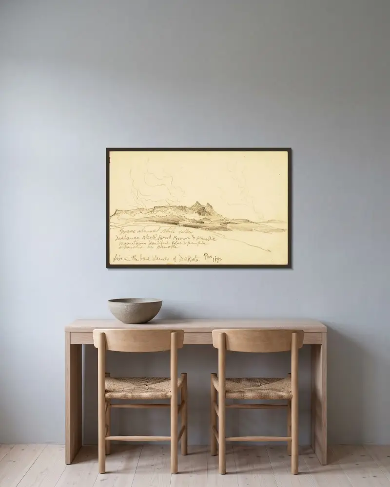 Eld i Dakotas ödemarker av Thomas Moran inramad på en vägg