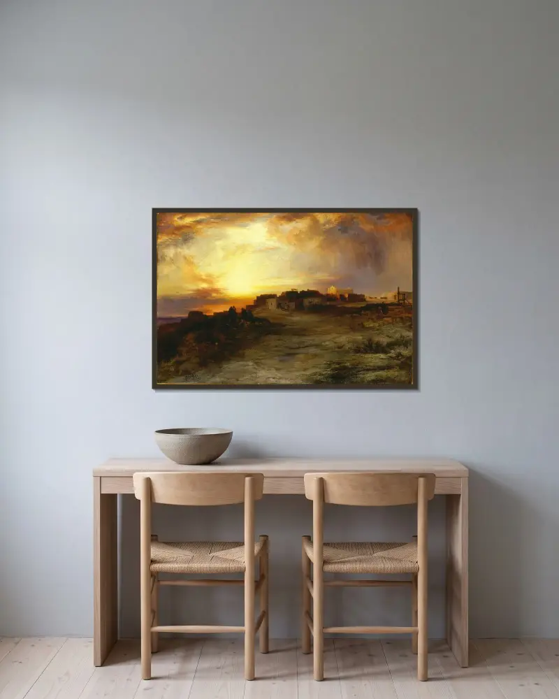 Pueblo at Sunset (Laguna) av Thomas Moran inramad på en vägg