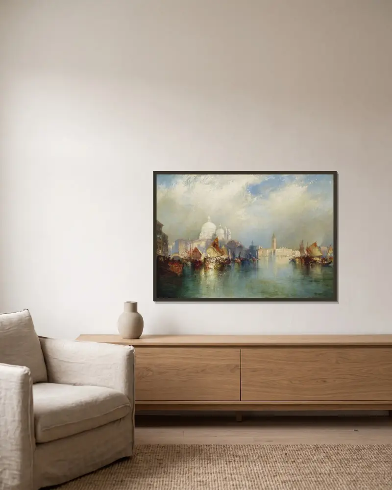 Venetianskt motiv av Thomas Moran inramad på en vägg