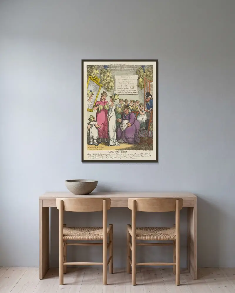En hattbutik av Thomas Rowlandson inramad på en vägg