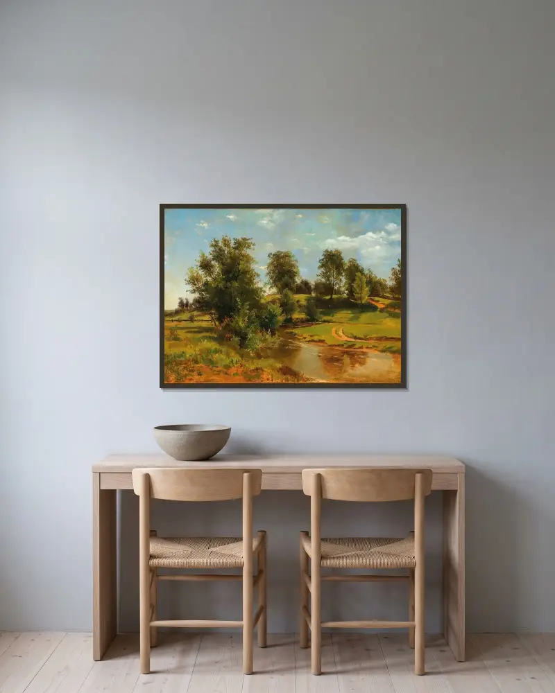 Eine hüglige Landschaft mit Bach von Tina Blau gerahmt an einer Wand