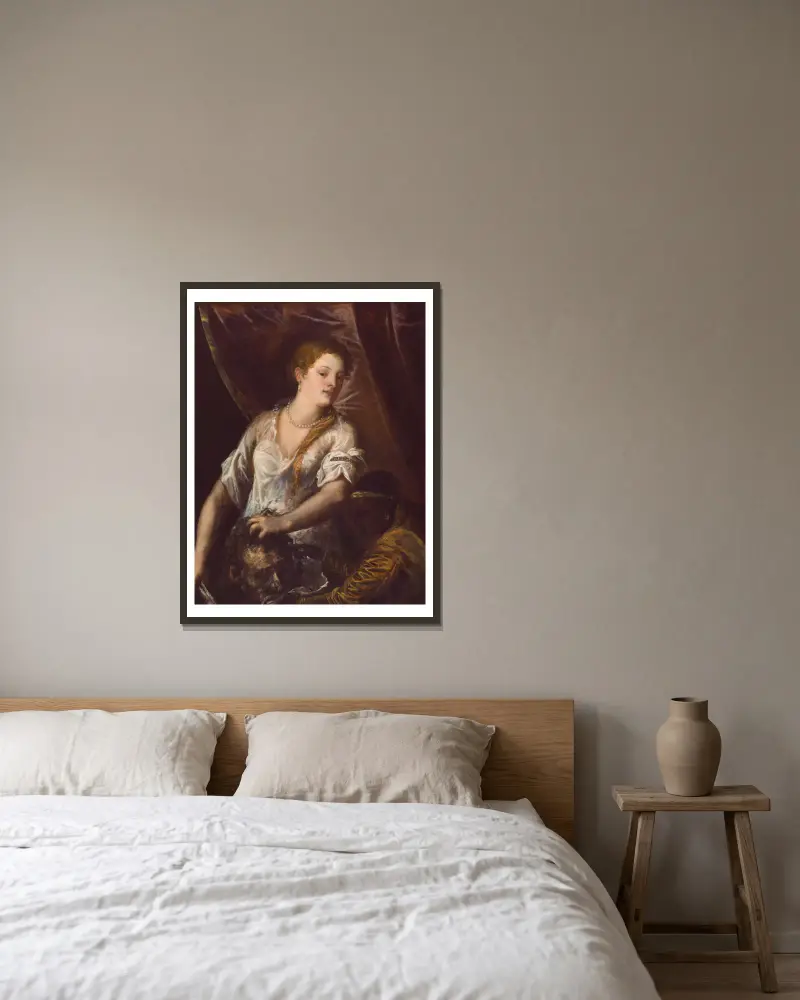 Judith and Her Maidservant with the Head of Holofernes av Titian inramad på en vägg