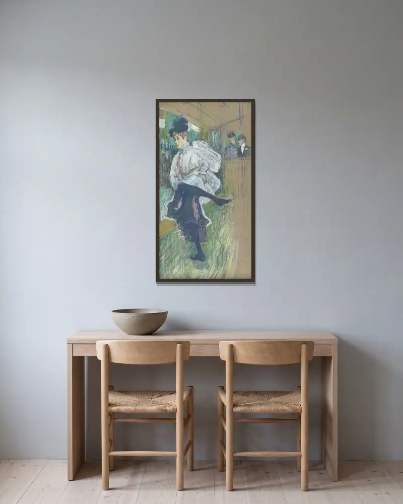 Jane Avril tanzend von Henri de Toulouse-Lautrec gerahmt an einer Wand