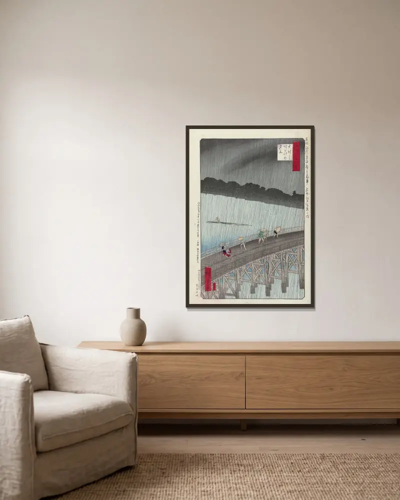 Ohashi Atake no yudachi av Utagawa Hiroshige inramad på en vägg