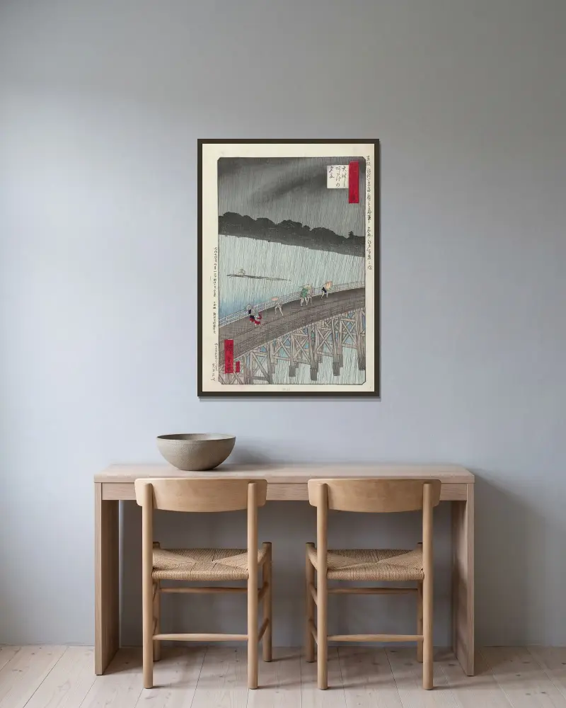 Ohashi Atake no yudachi av Utagawa Hiroshige inramad på en vägg