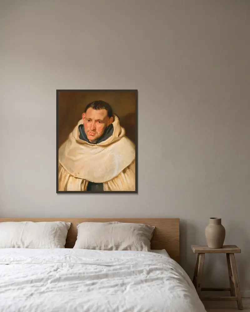 Portrait of a Carmelite monk av Anthony van Dyck inramad på en vägg