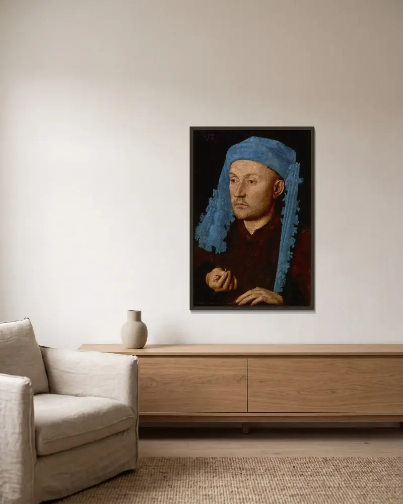 Mann mit blauer Mütze von Jan van Eyck gerahmt an einer Wand