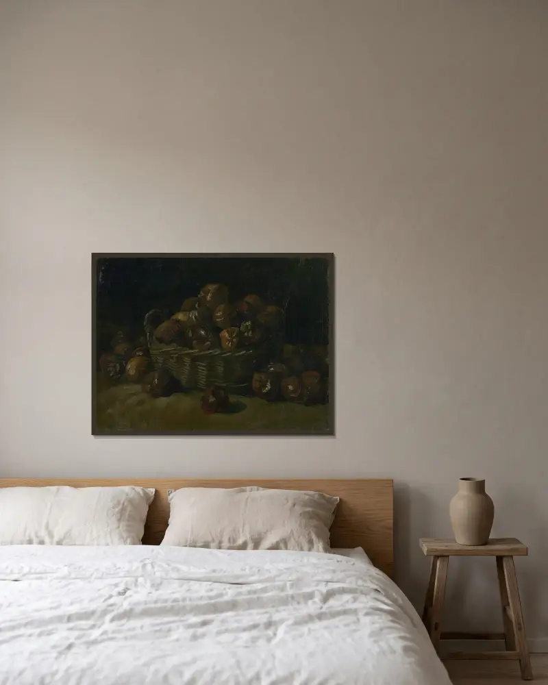 Basket of apples av Vincent van Gogh inramad på en vägg