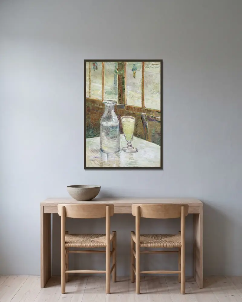 Kavárenský stůl s absintem, Vincent van Gogh v rámu na stěně