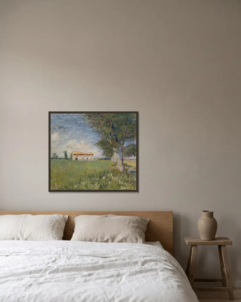 Farmhouse in a wheat field av Vincent van Gogh inramad på en vägg