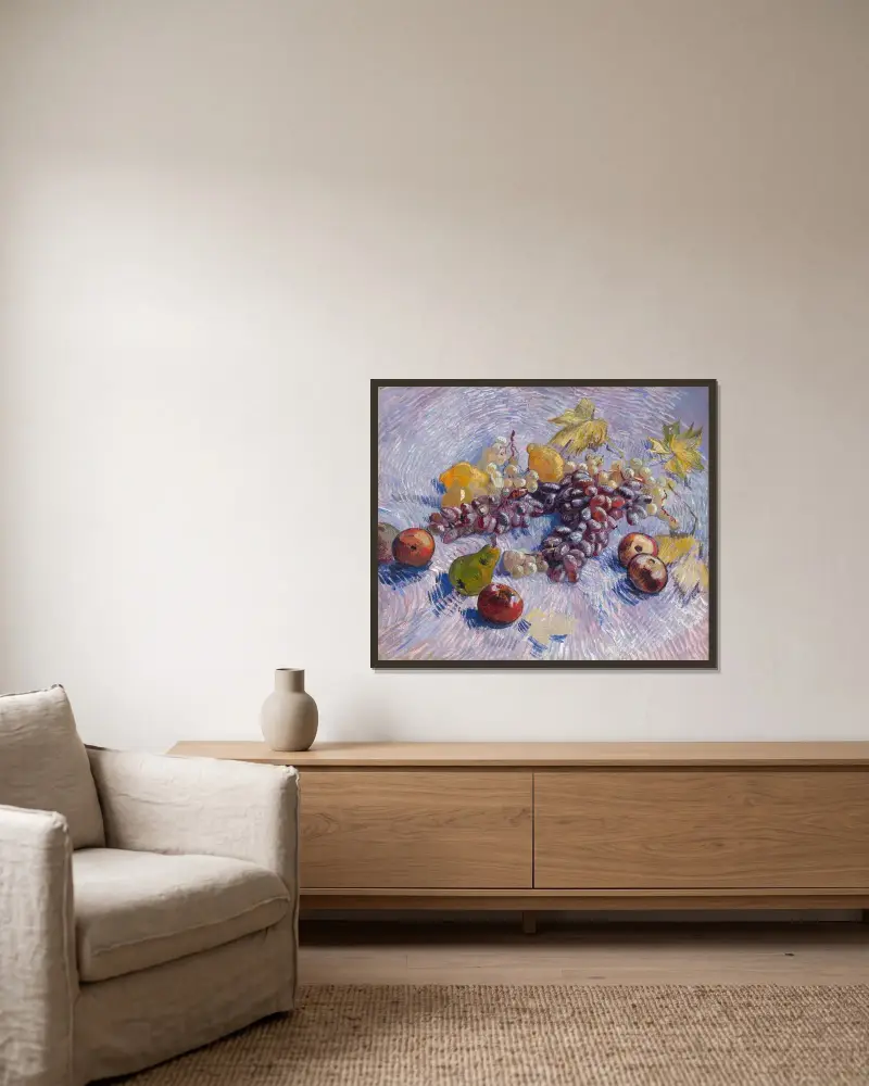 Weintrauben, Zitronen, Birnen und Äpfel von Vincent van Gogh gerahmt an einer Wand