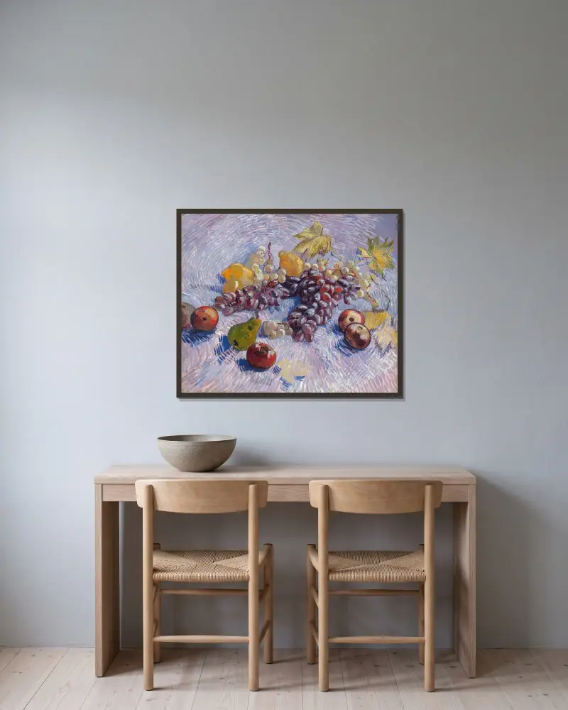 Weintrauben, Zitronen, Birnen und Äpfel von Vincent van Gogh gerahmt an einer Wand