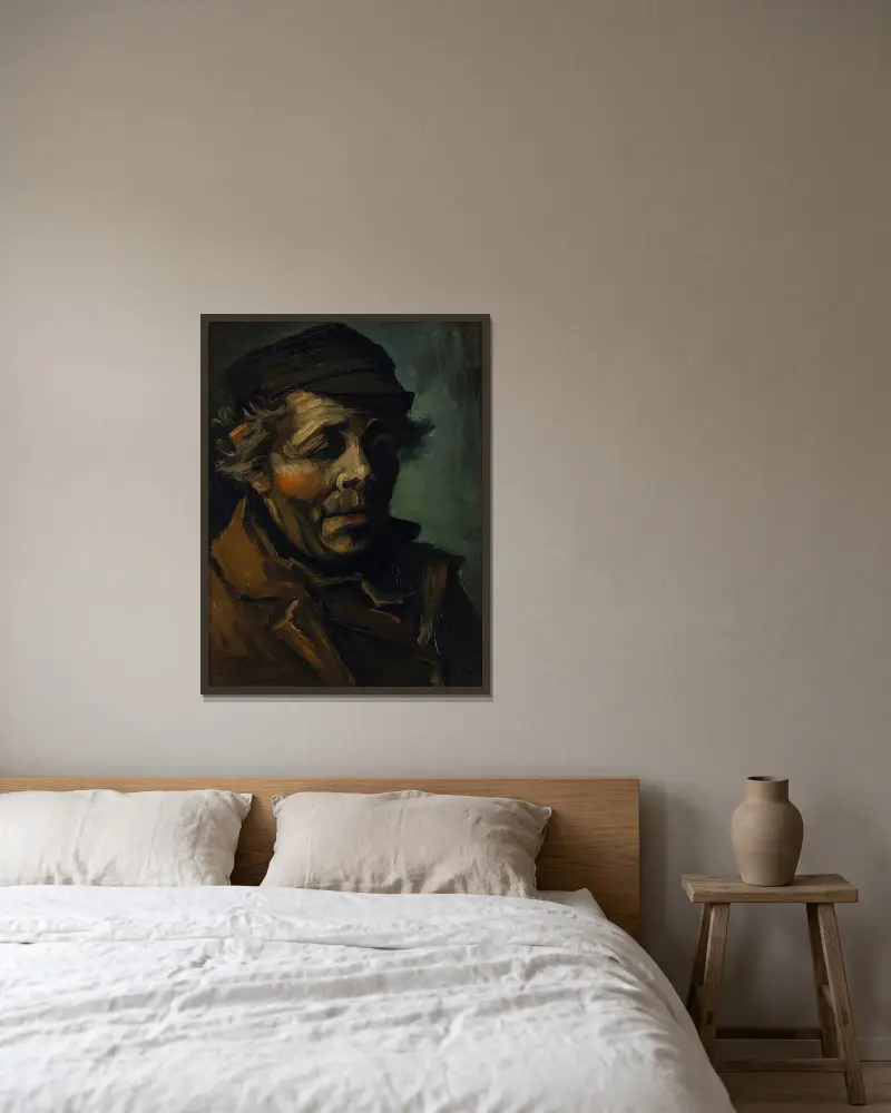 Head Of A Peasant, 1884 av Vincent van Gogh inramad på en vägg