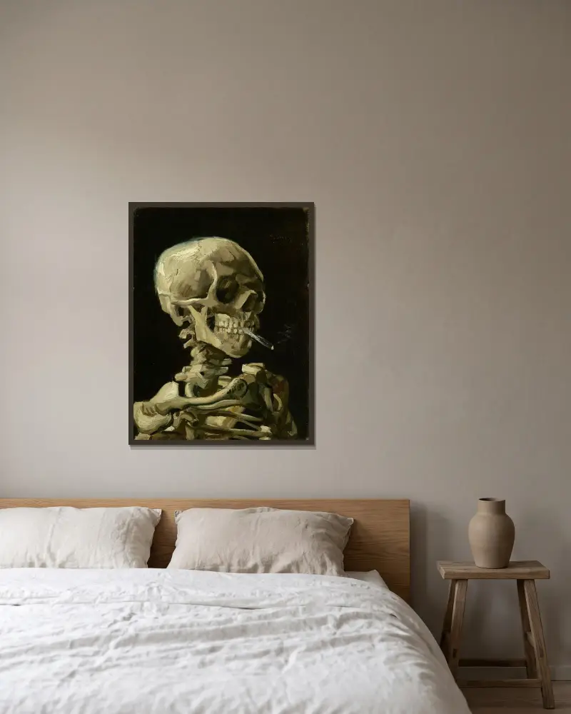 Skeletthuvud med brinnande cigarett av Vincent van Gogh inramad på en vägg