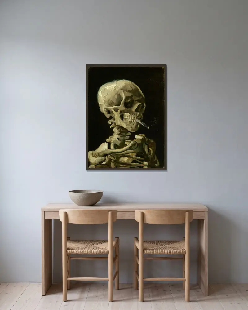 Skeletthuvud med brinnande cigarett av Vincent van Gogh inramad på en vägg