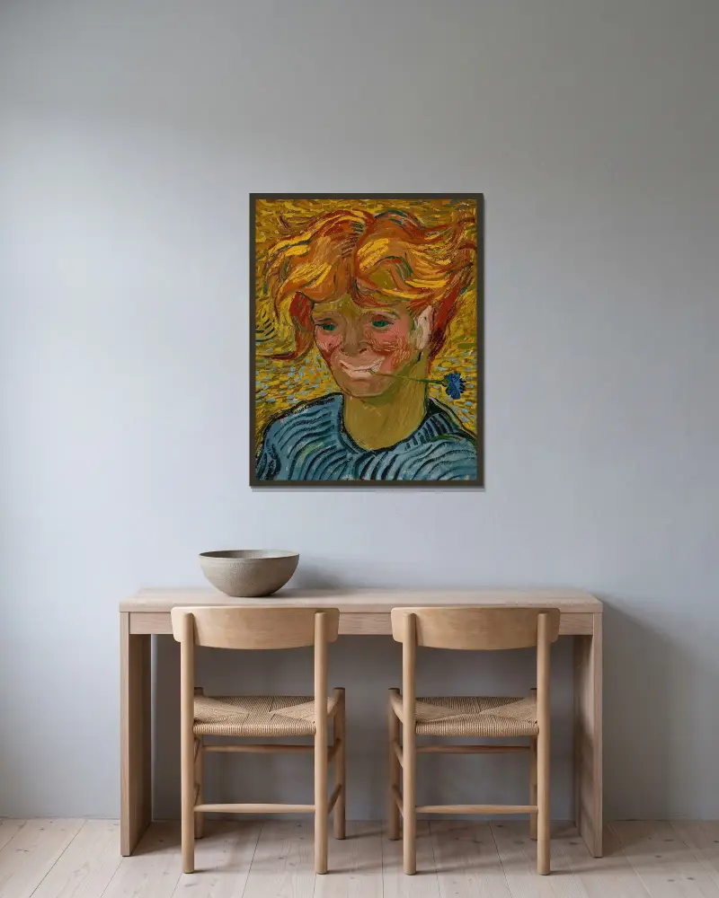 Jeune homme au bleuet av Vincent van Gogh inramad på en vägg