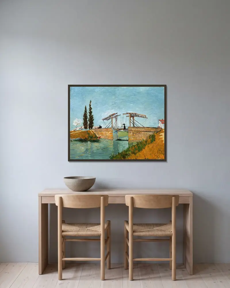 Die Brücke von Langlois in Arles von Vincent van Gogh gerahmt an einer Wand