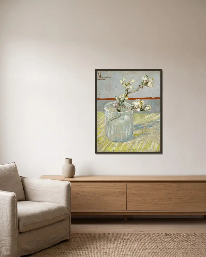 Sprig of flowering almond in a glass av Vincent van Gogh inramad på en vägg