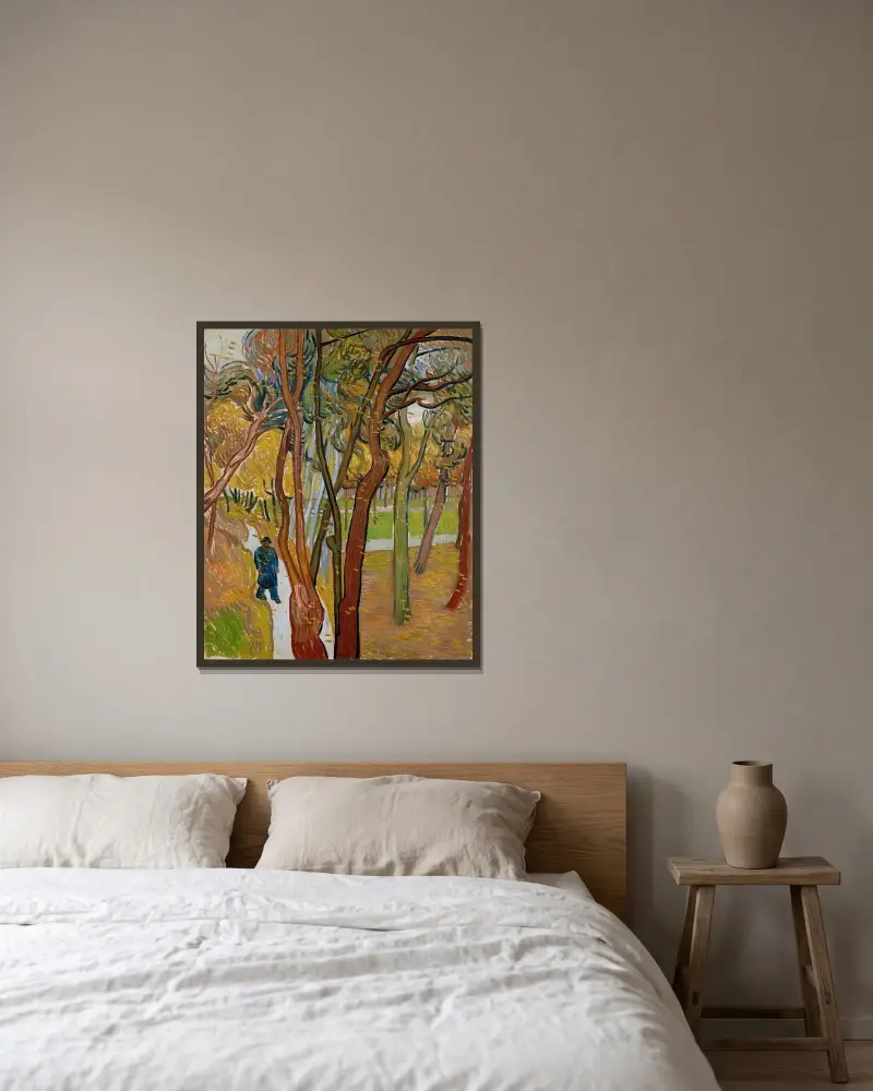 Trädgården vid Saint-Paul-sjukhuset (Lövens fall) – nr 2 av Vincent van Gogh inramad på en vägg