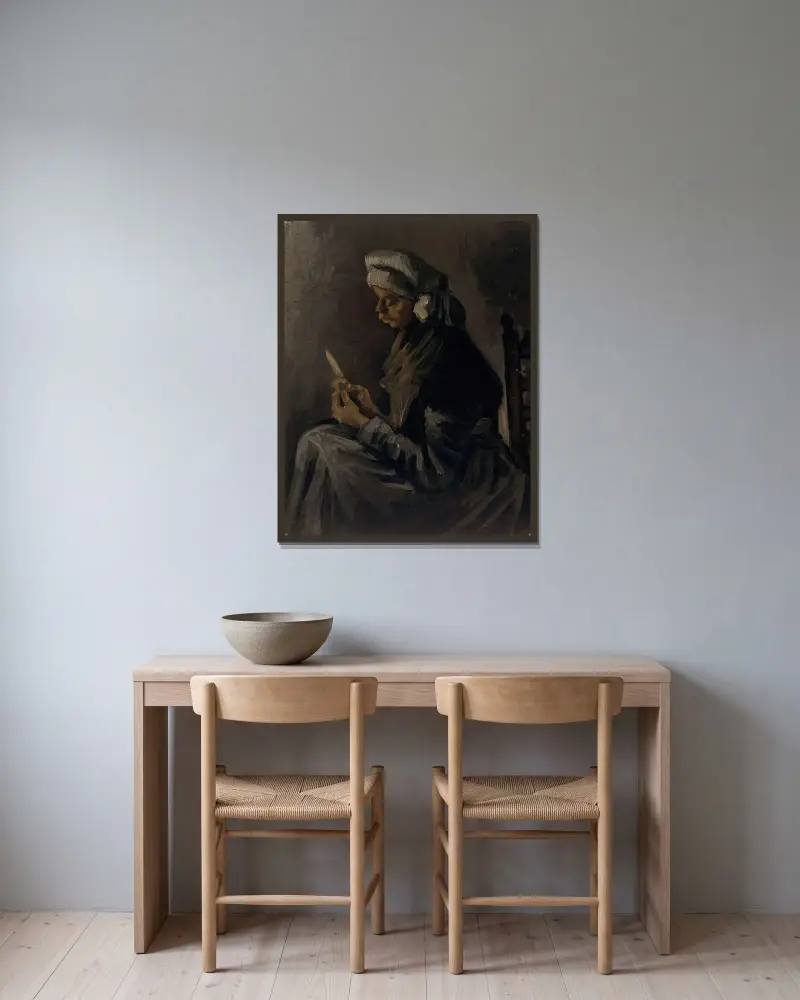 Die Kartoffelschälerin von Vincent van Gogh gerahmt an einer Wand