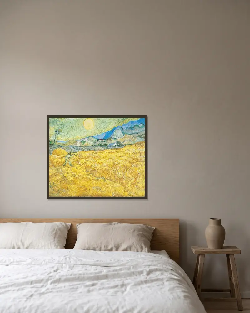 Wheat Field Behind Saint-Paul Hospital with a Reaper av Vincent van Gogh inramad på en vägg