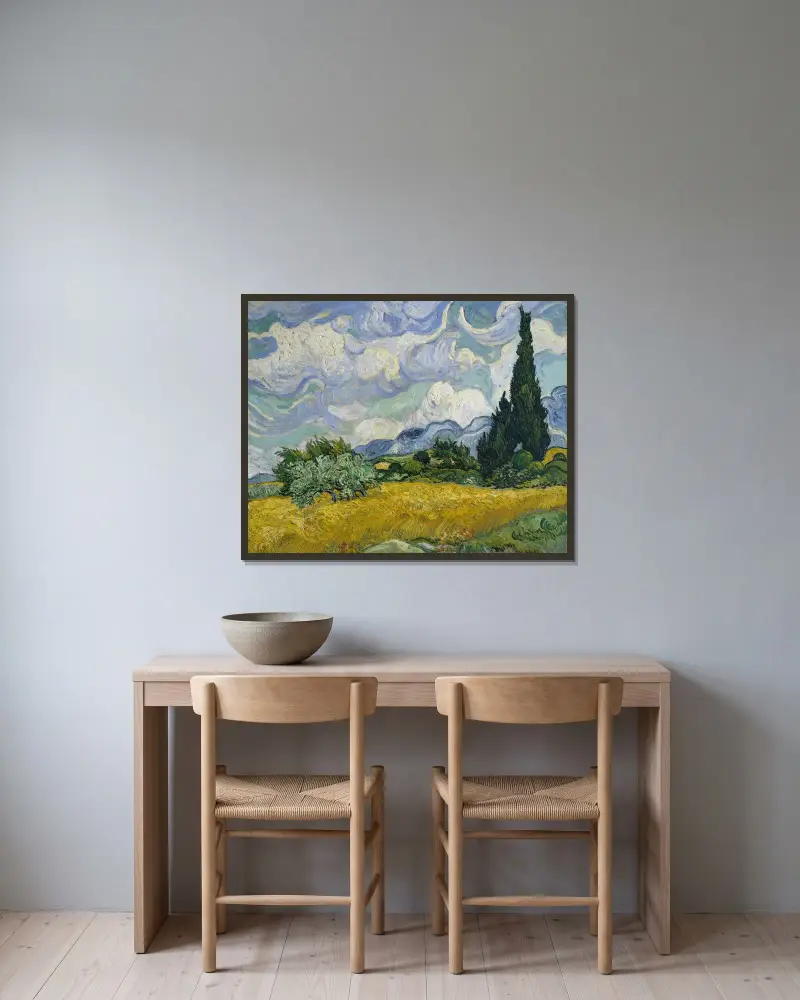 Weizenfeld mit Zypressen von Vincent van Gogh gerahmt an einer Wand