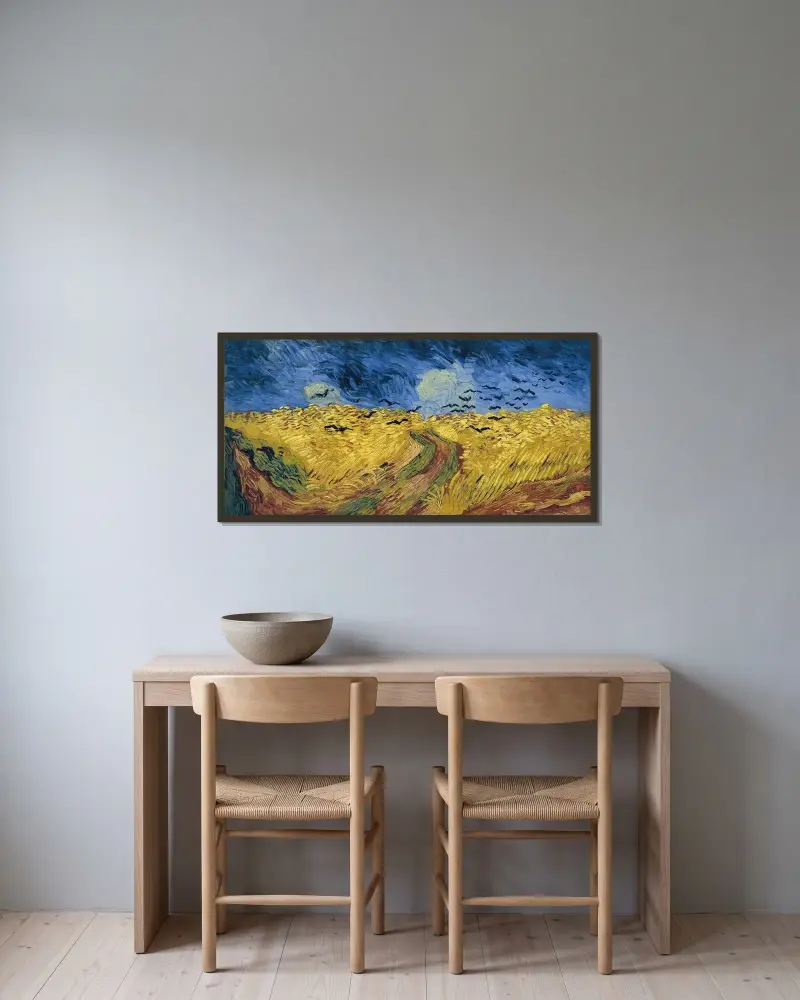 Weizenfeld mit Krähen von Vincent van Gogh gerahmt an einer Wand