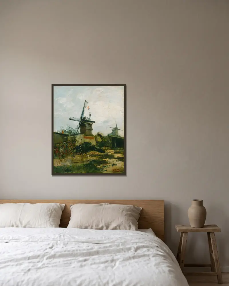 Windmills on Montmartre av Vincent van Gogh inramad på en vägg