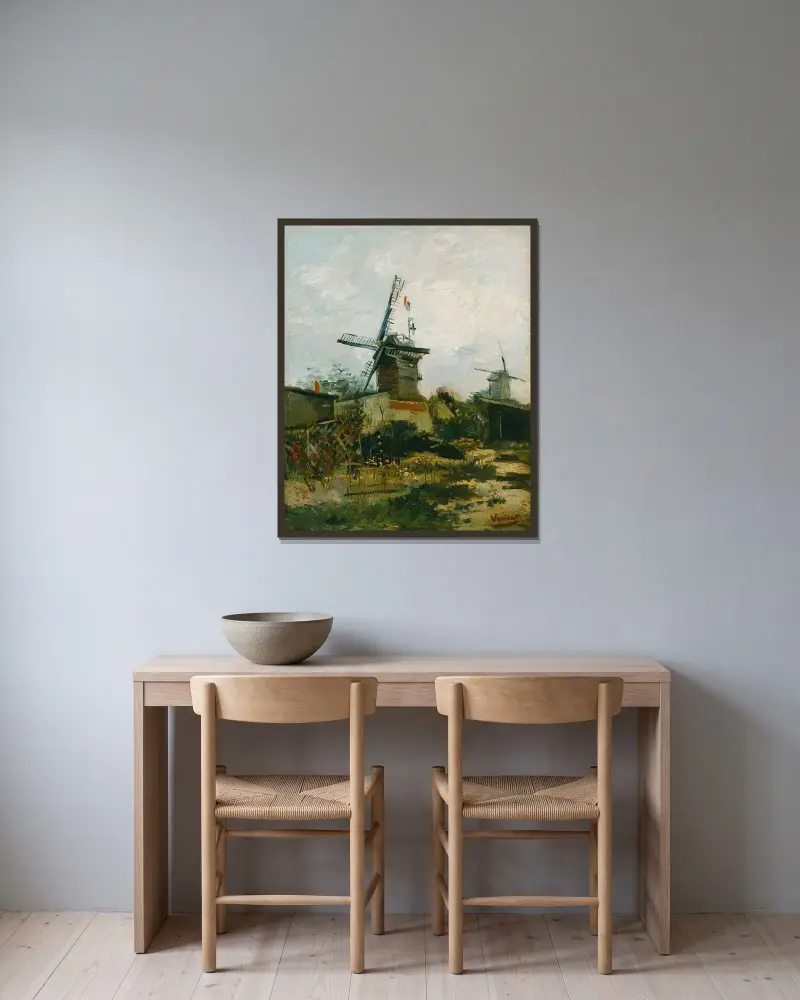 Windmills on Montmartre av Vincent van Gogh inramad på en vägg
