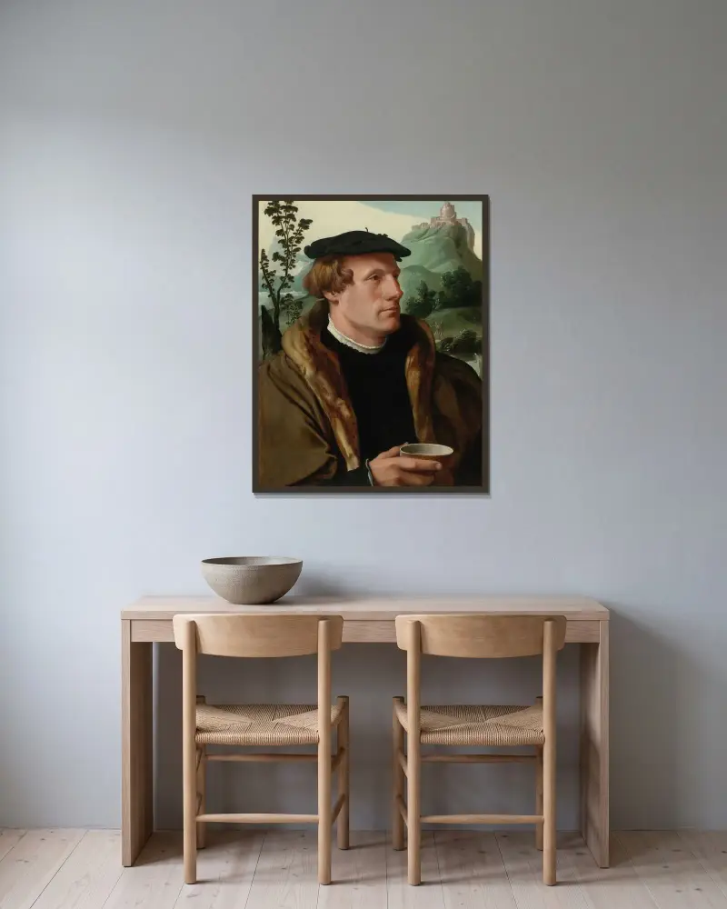 Porträtt av en herre i pälsfodrad mantel av Maarten Van Heemskerck inramad på en vägg