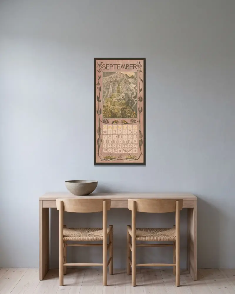 Kalenderblad september med kaniner av Theo van Hoytema inramad på en vägg