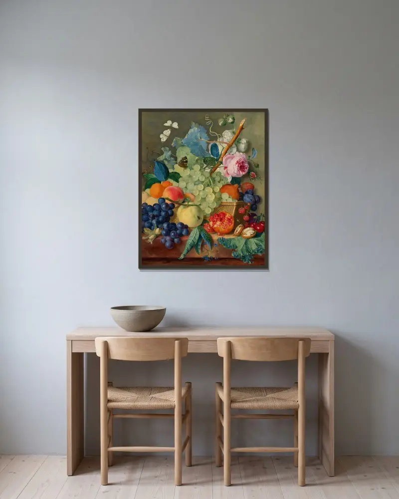 Frukt, rosor och pioner i en korg med hasselnötter på en marmorkonsol av Jan van Huysum inramad på en vägg