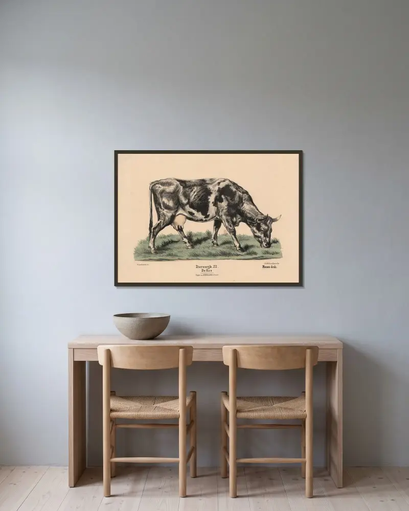 De Koe av Hendrik Jan van Lummel inramad på en vägg