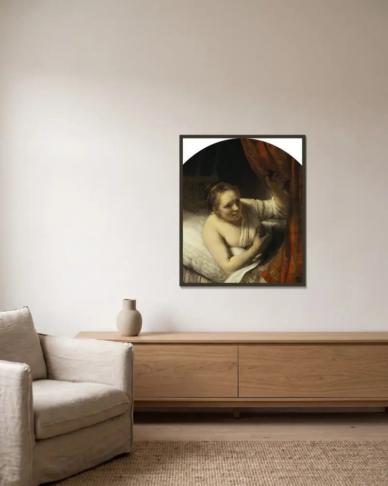 A Woman in Bed av Rembrandt van Rijn inramad på en vägg