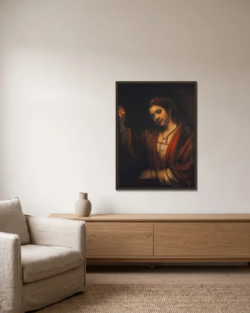 Portrait of Hendrickje Stoffels av Rembrandt van Rijn inramad på en vägg