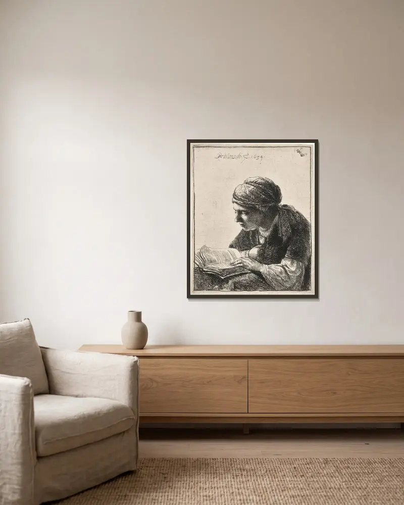 Lesende Frau, 1634 von Rembrandt van Rijn gerahmt an einer Wand