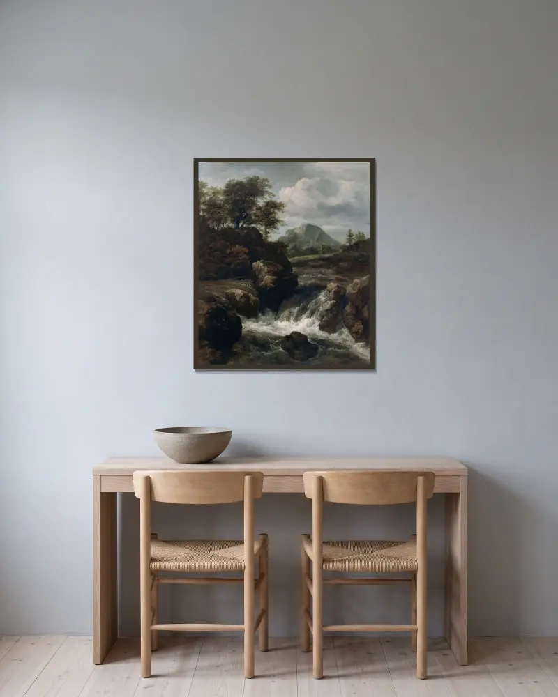Ett vattenfall av Jacob van Ruisdael inramad på en vägg