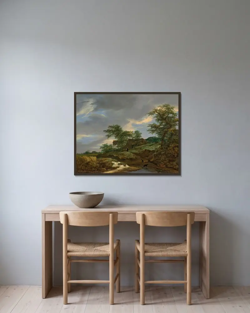 Waldlandschaft mit einem Mann und zwei Hunden auf einem Pfad, dahinter ein Landhaus von Jacob van Ruisdael gerahmt an einer Wand