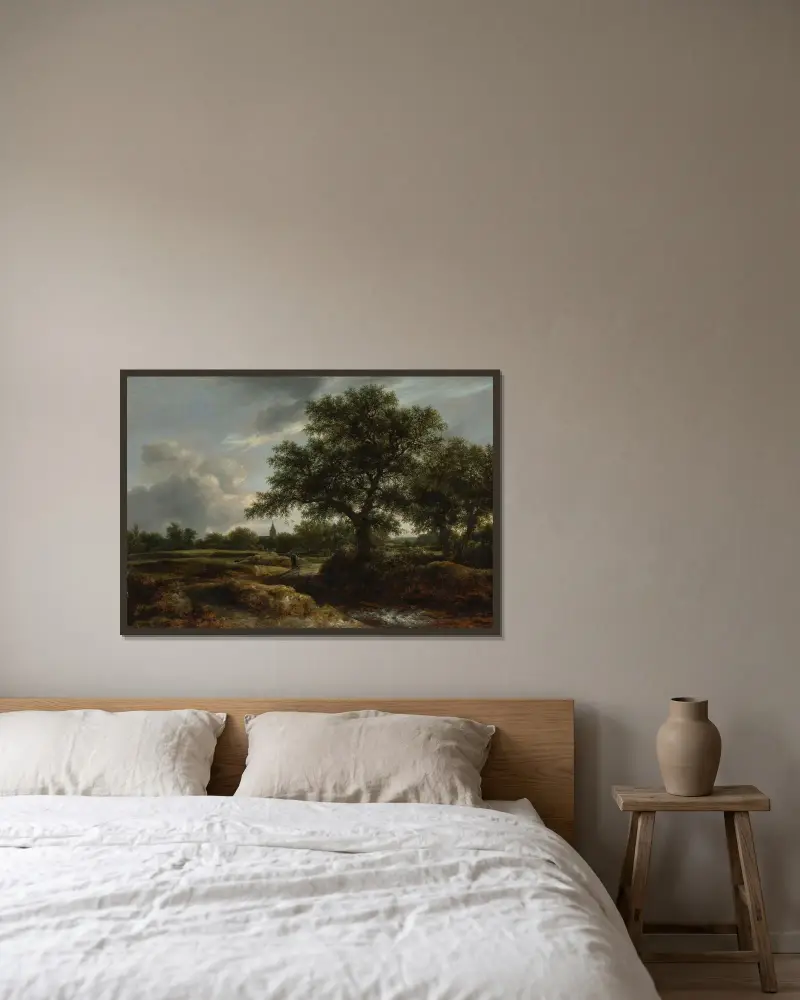 Landskap med by i fjärran av Jacob van Ruisdael inramad på en vägg