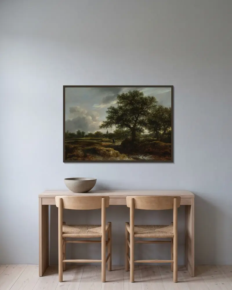 Landskap med by i fjärran av Jacob van Ruisdael inramad på en vägg