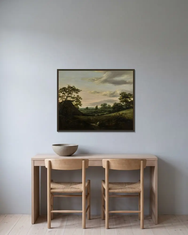Landskap med sädesfält och ett halmtakslada av Jacob van Ruisdael inramad på en vägg