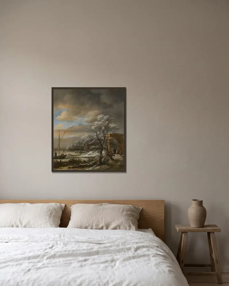 Vinterlandskap av Jacob van Ruisdael inramad på en vägg