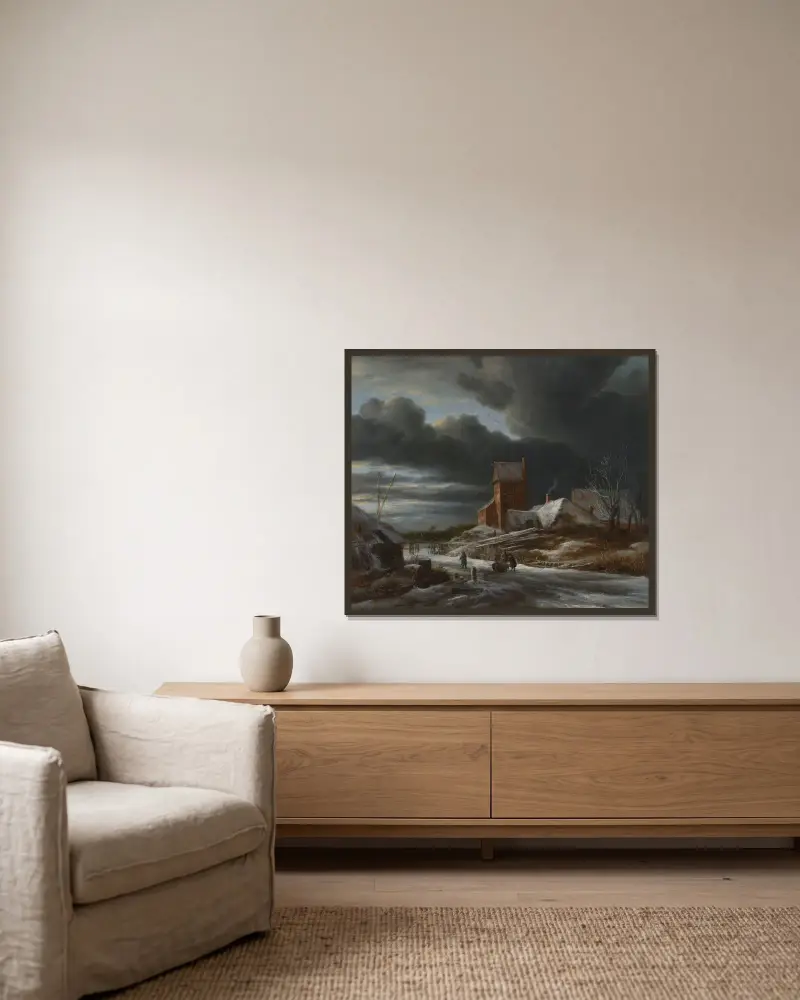 Vinterlandskap av Jacob van Ruisdael inramad på en vägg