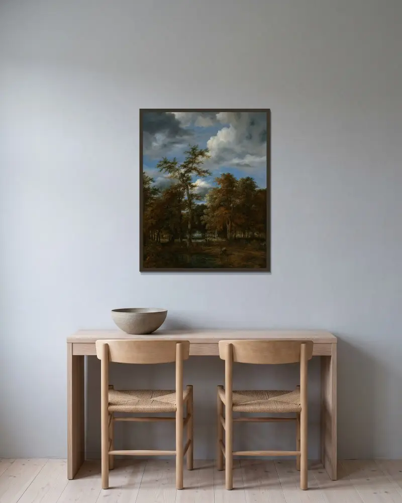 Skogslandskap av Jacob van Ruisdael inramad på en vägg