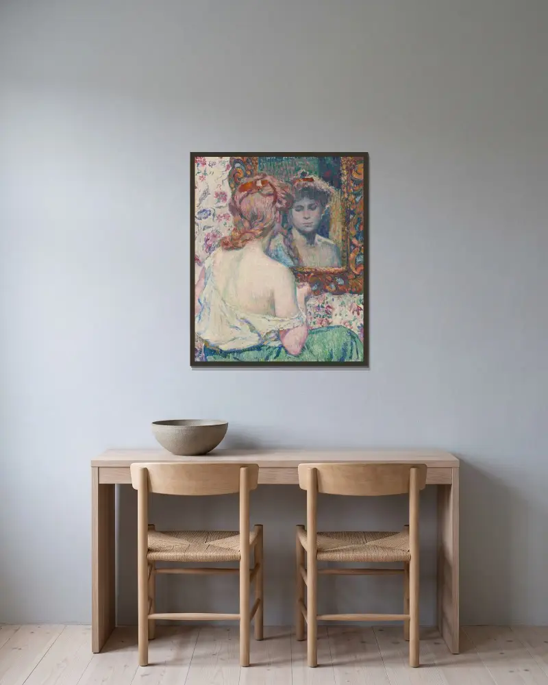 Kvinna vid spegeln av Theo van Rysselberghe inramad på en vägg
