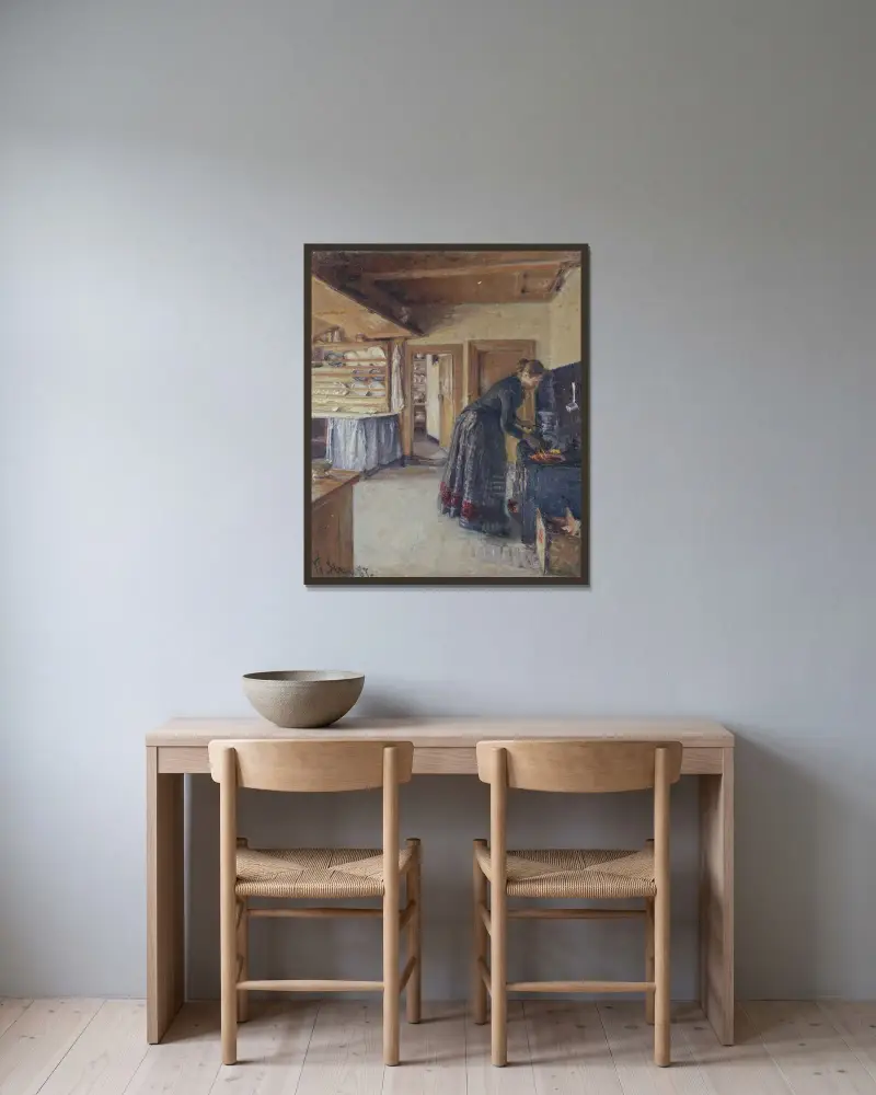 Kitchen, with the artist’s Wife av Viggo Johansen inramad på en vägg